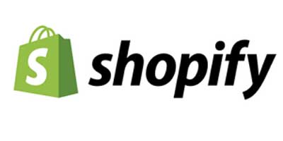 grüne Einkaufstasche mit weissen S, schwarzer Schriftzug Shopify